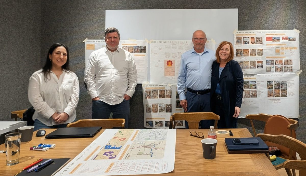 The Rise + Rescue and Diverse Studio team at the design boards